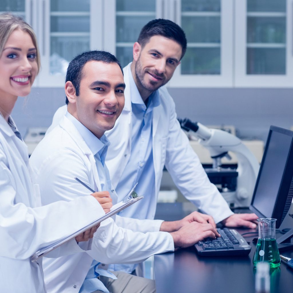 Science students working together in the lab at the university Science students working together in the lab at the university